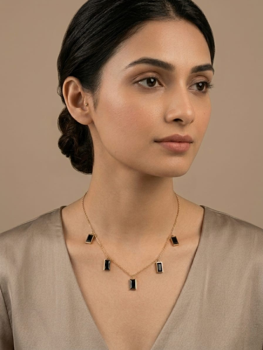A model is wearing our Black Rectangle Crystal Charms Rose Gold Chain Necklace