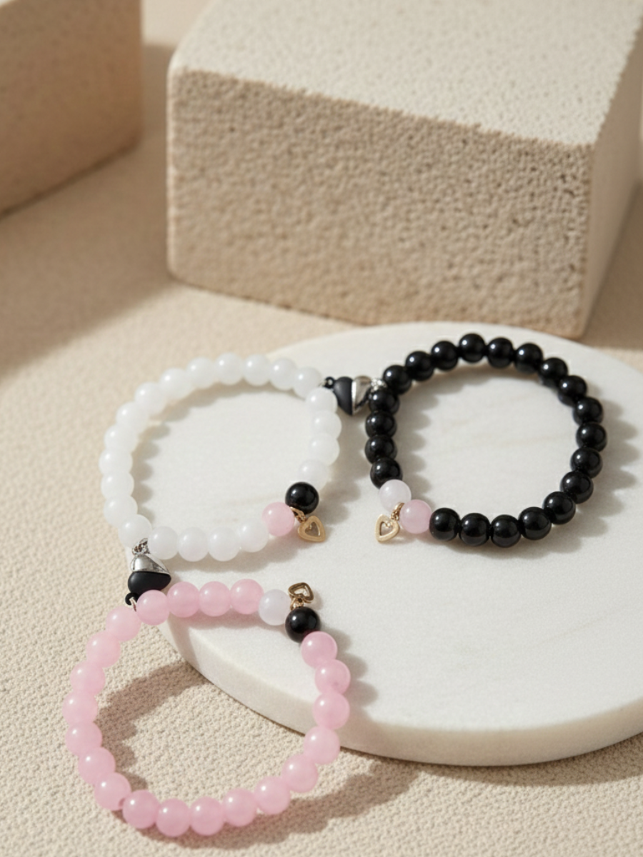 Buy Black, Pink and White Trio Heart Charms Beaded Magnetic Bracelets Online in India - TheJewelbox