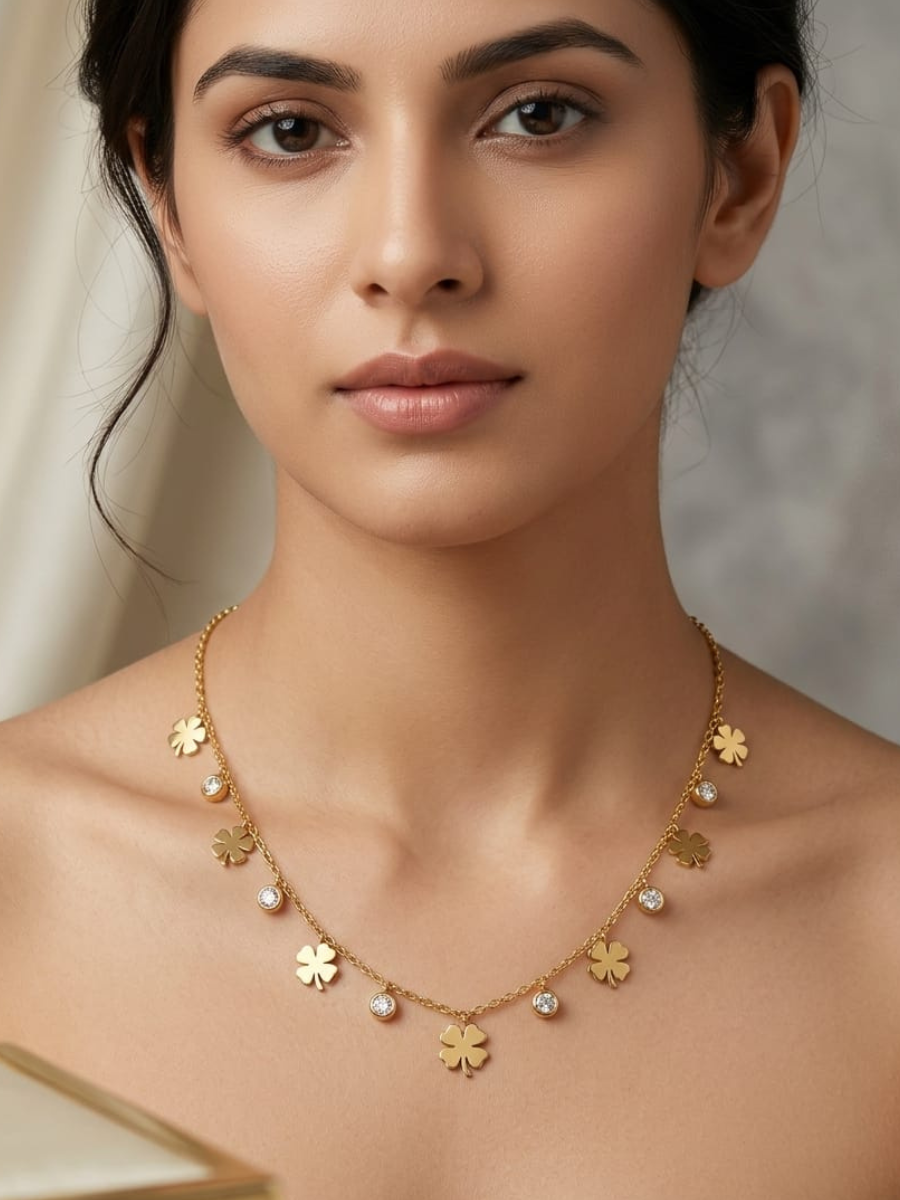 A model is wearing our Clover and Diamond Charms Minimal Golden Chain Necklace