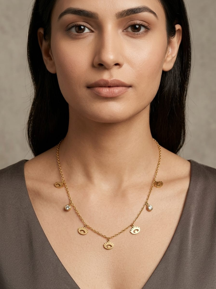 A model is wearing our Evil Eye and Diamond Charms Minimal Golden Chain Necklace