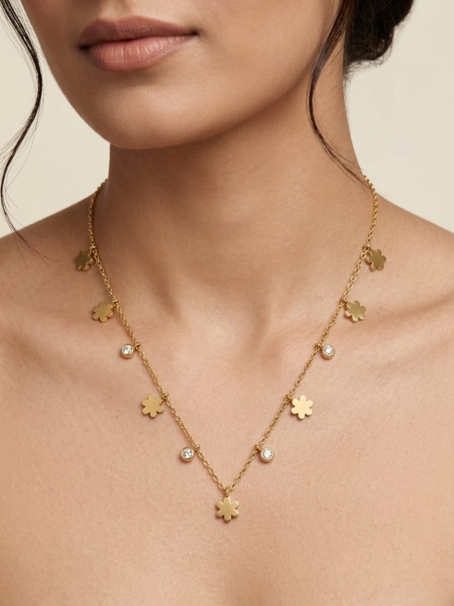 A model is wearing our Flower and Diamond Charms Golden Chain Necklace