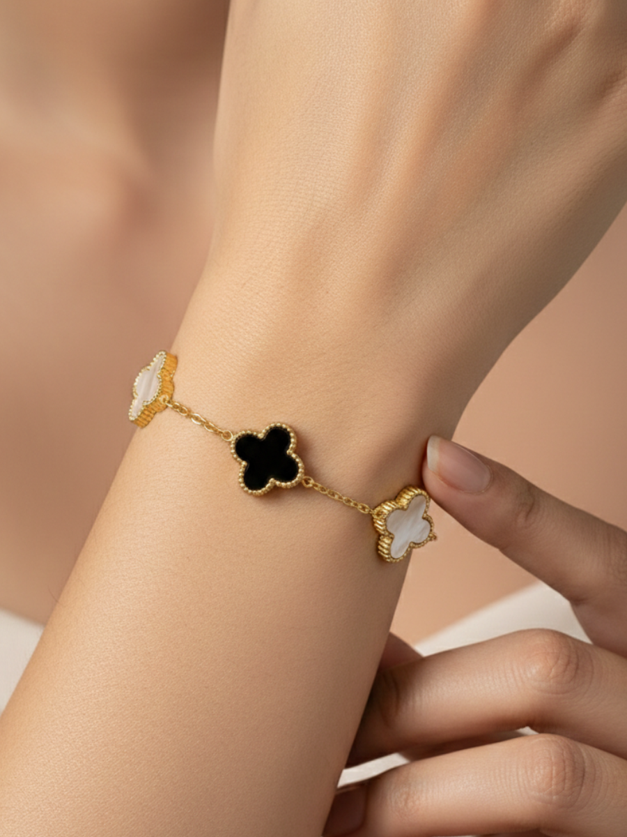 Gold Plated Black and White Reversible Clover Charm Bracelet