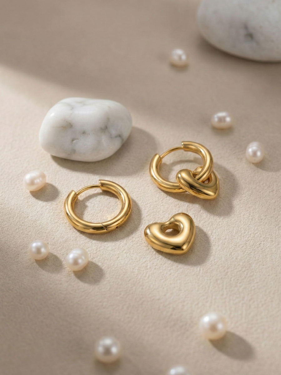 Gold plated puffy heart hoop earrings