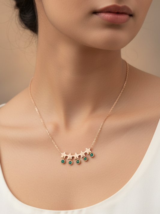 An Indian Model wearing our Rose Gold Five Star Green Stone Pendant Necklace