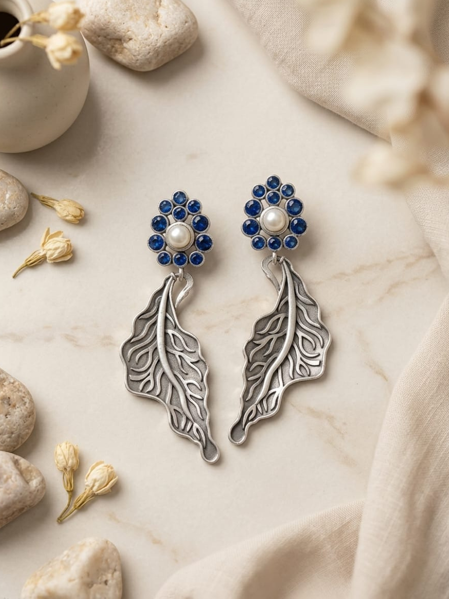 Buy Silver Oxidised Blue Stones Floral Leaf Drop Earrings Online in India