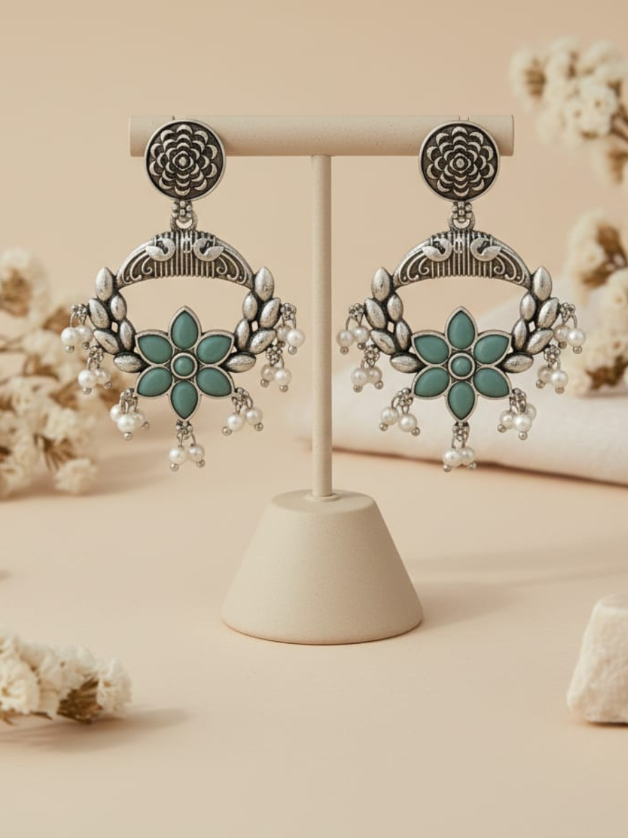 Traditional peacock motif pearl earrings