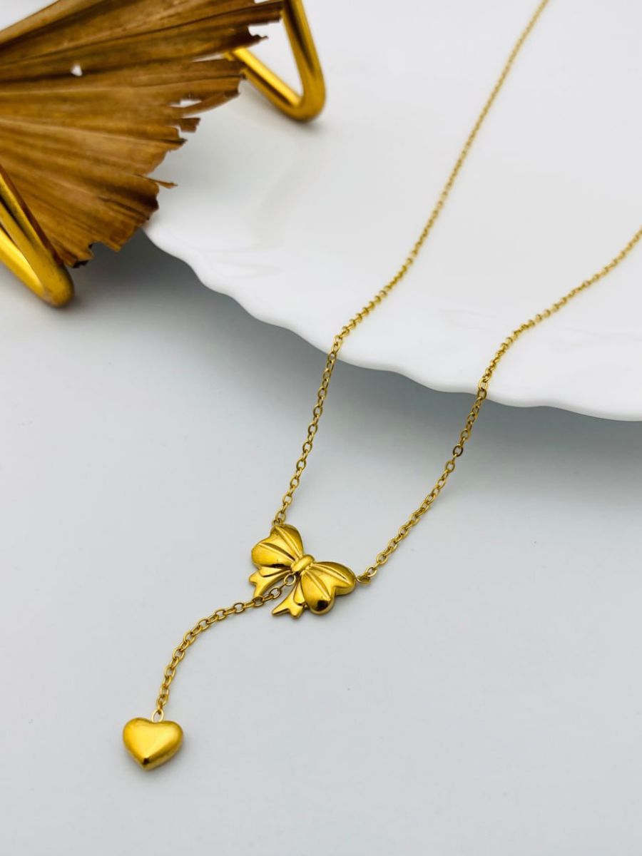 Buy Stylish Hanging Bow Charm Golden Chain Necklace Online - TheJewelbox