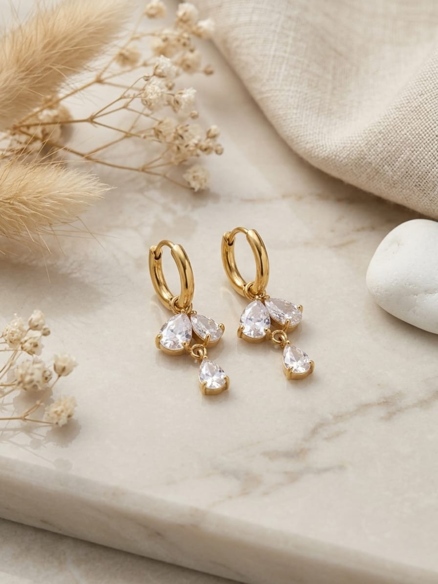 Buy Teardrop White Stones Golden Huggie Hoop Earrings Online in India