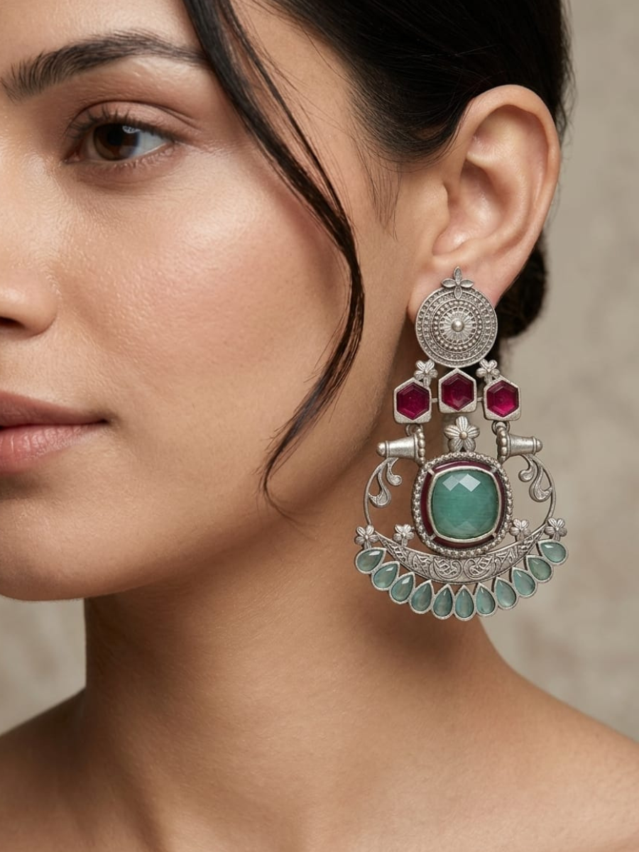 Turquoise pink stone oxidised earrings.