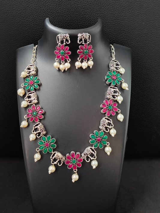 Buy Ruby Red and Green Flower and Elephant Shaped Oxidised Silver Necklace Online - TheJewelbox