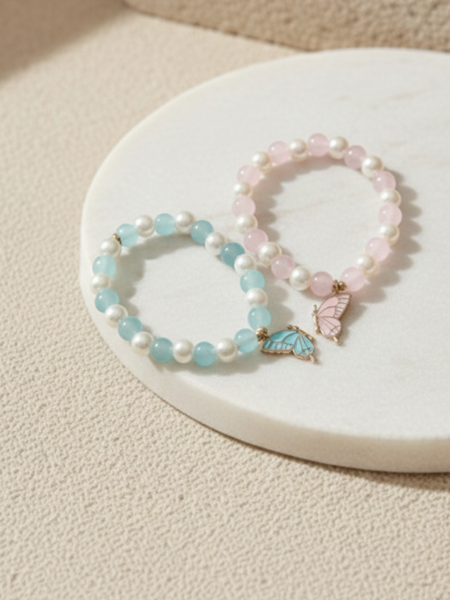 Buy Baby Pink and Sky Blue Butterfly Charms Beaded Bracelets Online in India - TheJewelbox