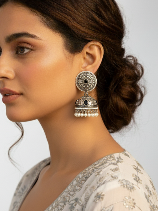 An Indian Model wearing our Black Stone German Silver Oxidised Jhumka Earrings