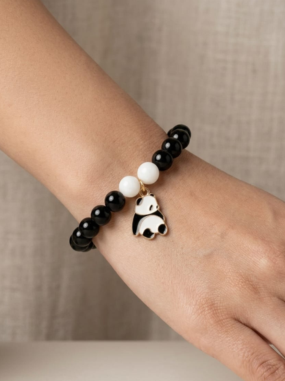 A model wearing Black and White Panda Charm Beaded Bracelet