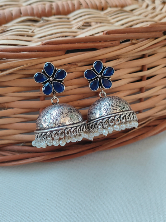 Buy Blue Flower Shaped Silver Lookalike Oxidised Pearl Jhumka Earrings - TheJewelbox