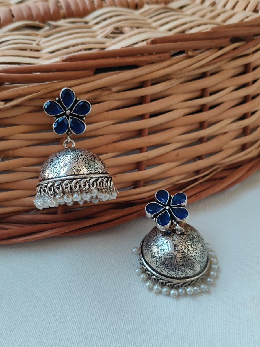 Blue Flower Shaped Silver Lookalike Oxidised Pearl Jhumka Earrings