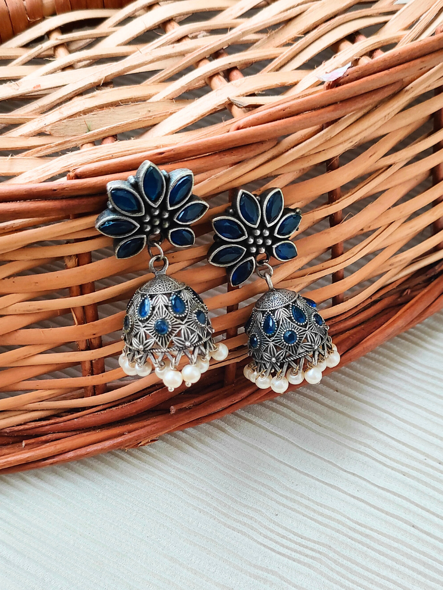 Buy  Blue Stone Flower Shaped Oxidised Silver Jhumka Earrings - TheJewelbox