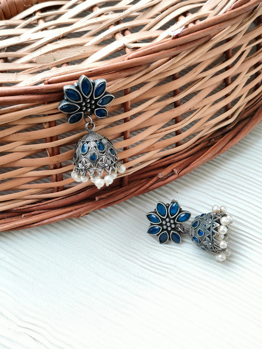 Blue Stone Flower Shaped Oxidised Silver Jhumka Earrings
