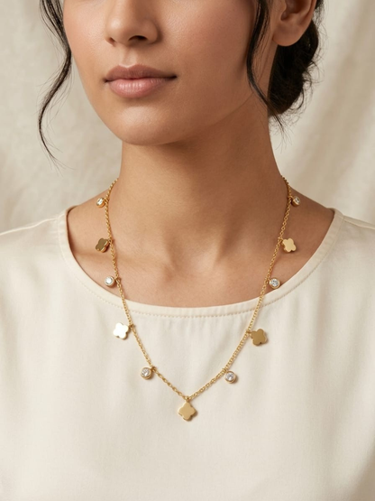 A model is wearing our Diamond and Floral Charms Golden Minimal Chain Necklace