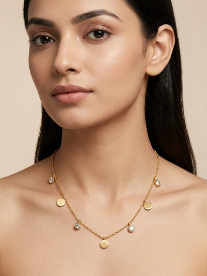 A model is wearing our Diamond and Round Charms Golden Minimal Chain Necklace