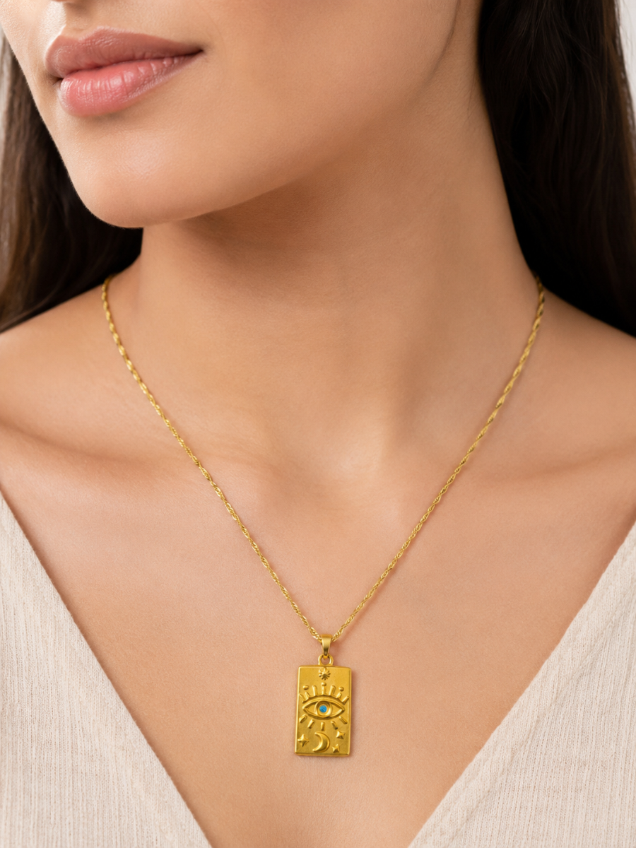 A model is wearing our Evil Eye Rectangular Pendant Golden Chain Necklace