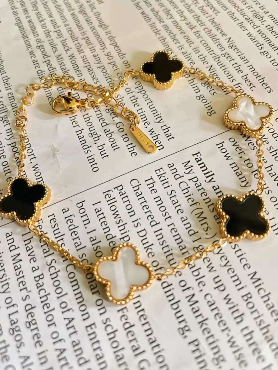 Buy Gold Plated Black and White Reversible Clover Charm Bracelet Online - TheJewelbox