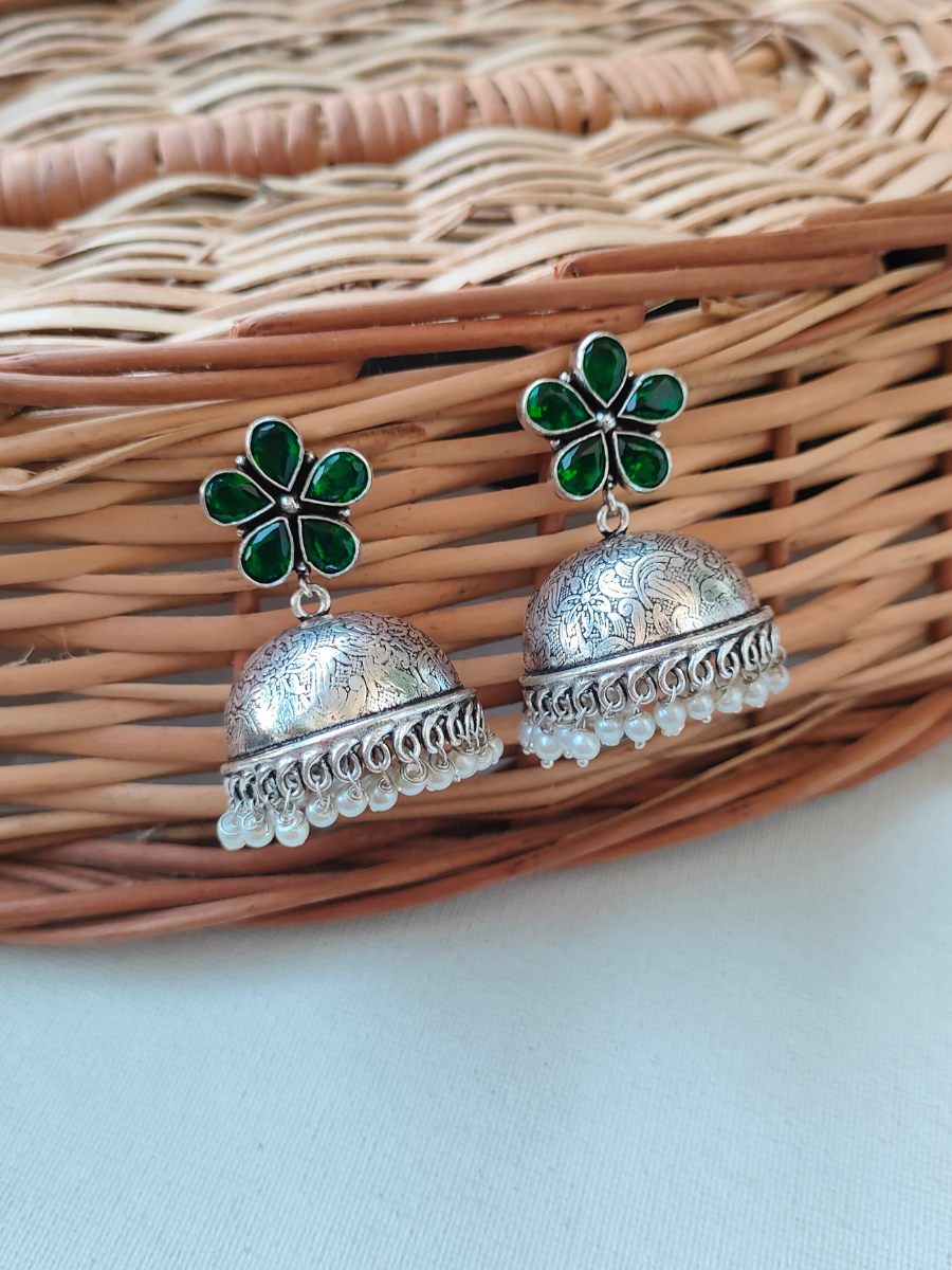 Buy Green Flower Shaped Silver Lookalike Oxidised Pearl Jhumka Earrings - TheJewelbox