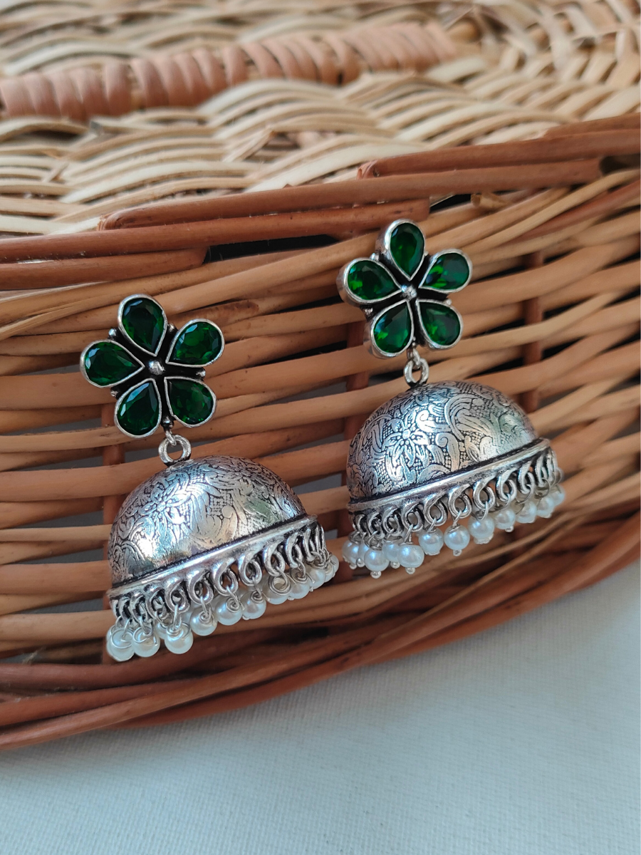 Green Flower Shaped Silver Lookalike Oxidised Pearl Jhumka Earrings