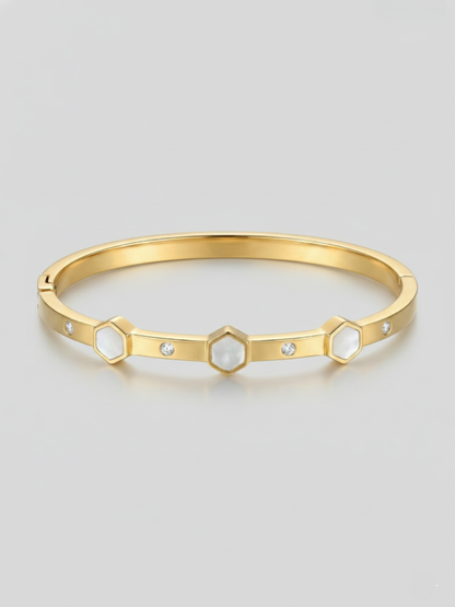 Gold bangle with white hexagons