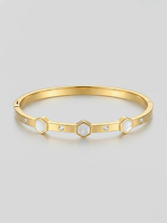 Gold bangle with white hexagons
