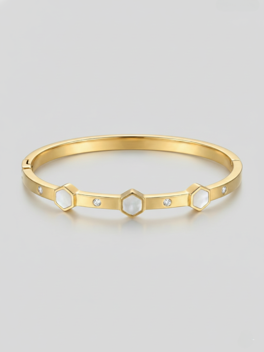 Gold bangle with white hexagons