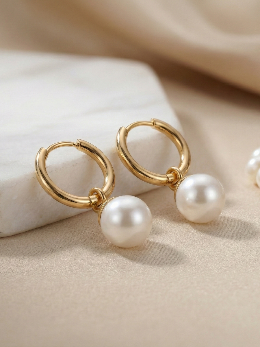 Gold hoop earrings with pearl