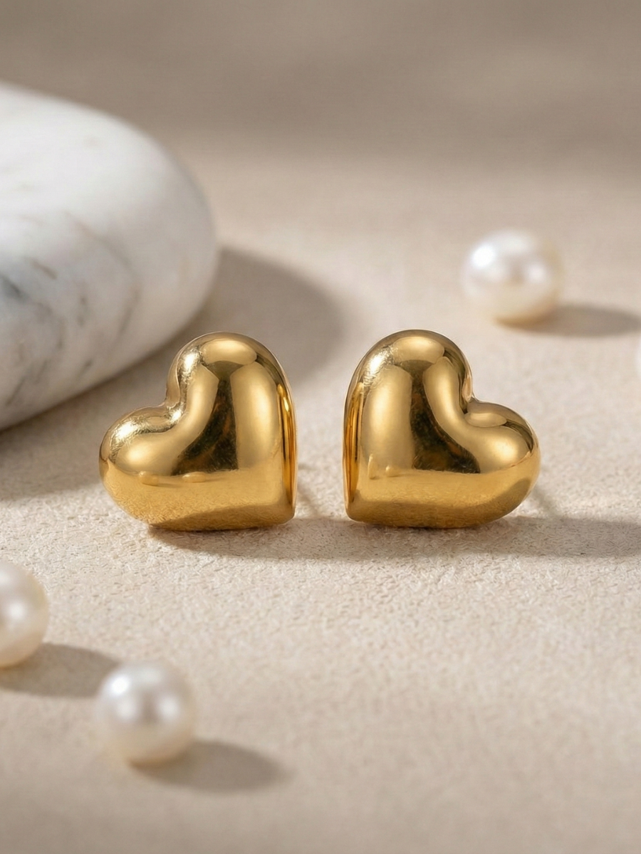 Gold puffy heart stud earrings