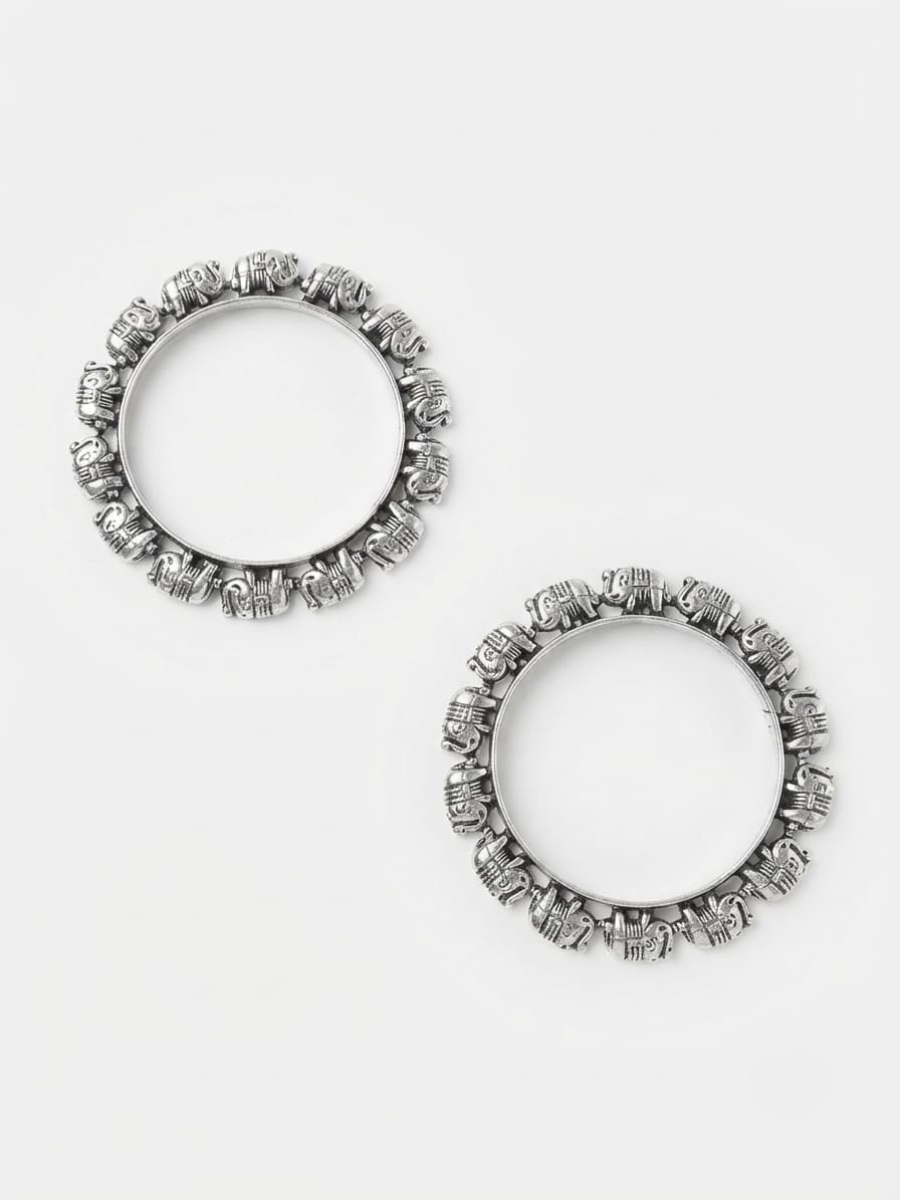 Antique finish silver carved elephant bangles.