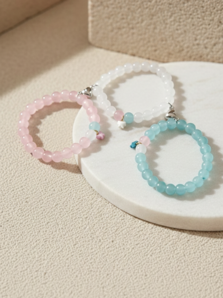 Buy Pink, Sky Blue and White Butterfly Charms Beaded Magnetic Bracelets Online in India - TheJewelbox