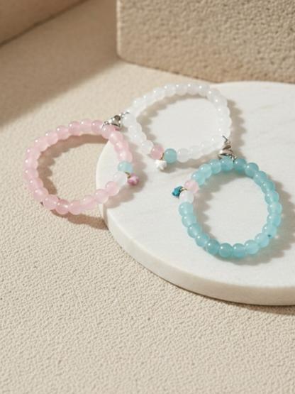 Buy Pink, Sky Blue and White Butterfly Charms Beaded Magnetic Bracelets Online in India - TheJewelbox