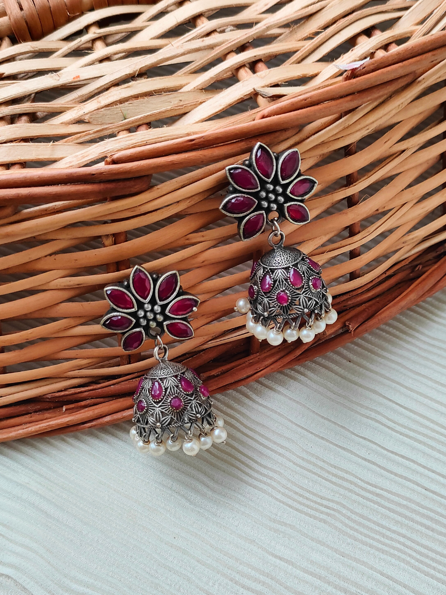 Rani Pink Stone Flower Shaped Oxidised Silver Jhumka Earrings