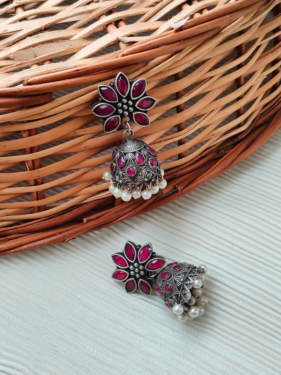 Rani Pink Stone Flower Shaped Oxidised Silver Jhumka Earrings