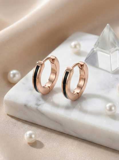 Rose gold earrings with black stripe