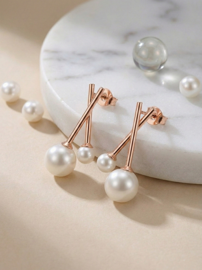 Rose gold geometric pearl earrings
