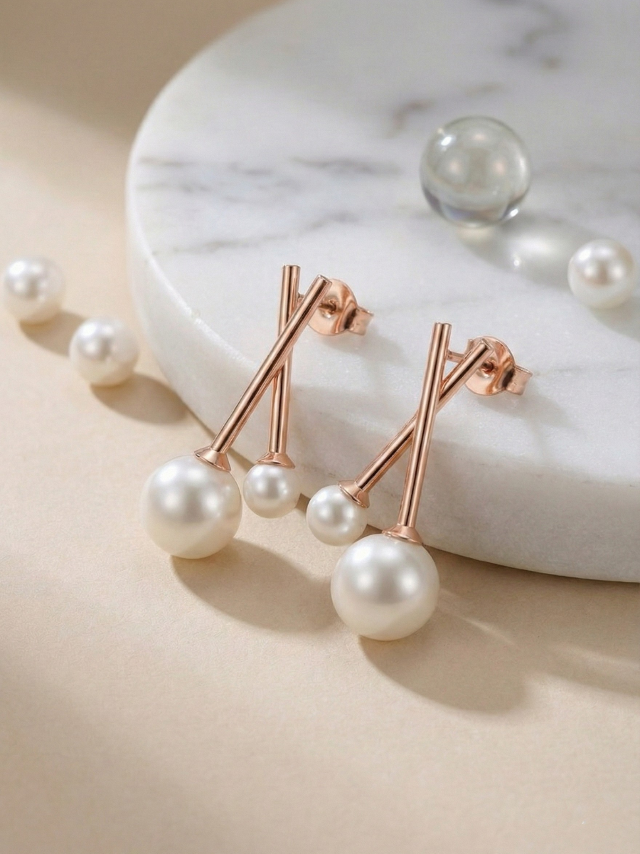 Rose gold geometric pearl earrings