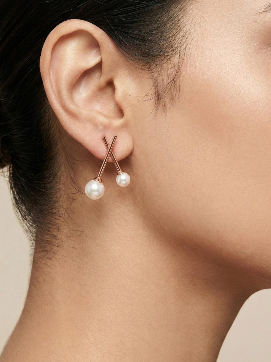 Modern criss-cross pearl drop earrings