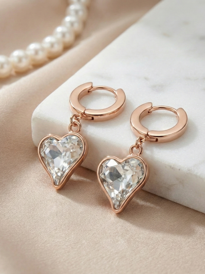 Rose gold heart huggie earrings