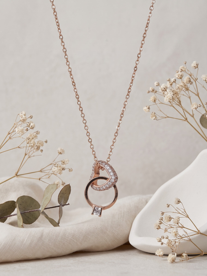 Buy Rose Gold Plated Interlocked Heart and Ring Pendant Necklace Online in India