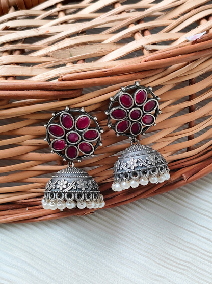 Buy Ruby Red Flower Shaped German Silver Oxidised Jhumka Earrings - TheJewelbox