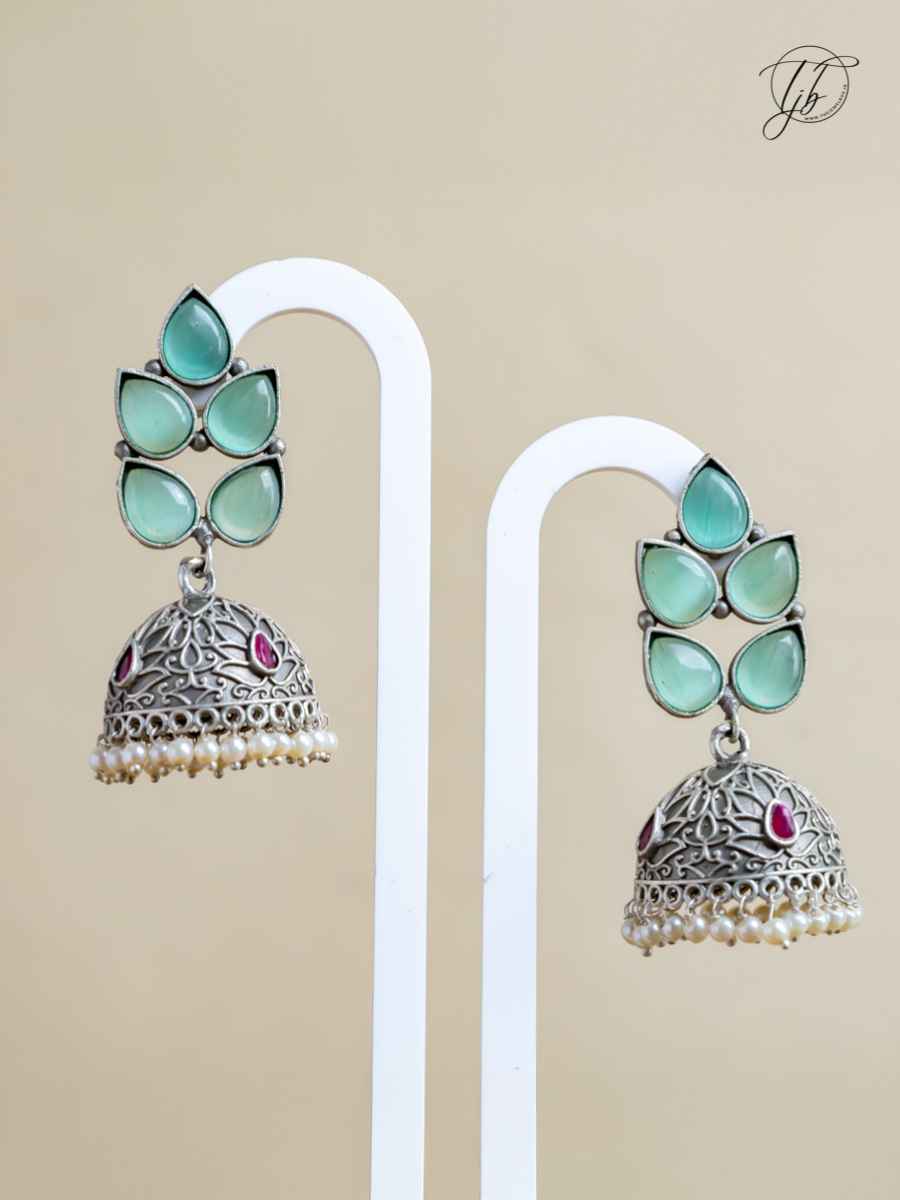 Buy Sea Green Stones Leaf Shaped Big Oxidised Silver Jhumka Earrings Online - TheJewelbox