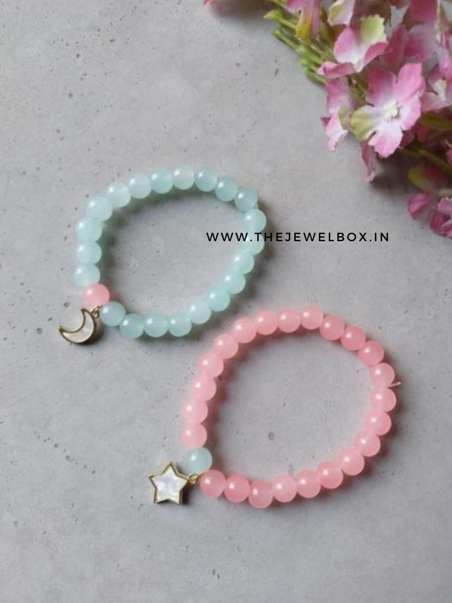 Buy Star and Moon Charms Pink and Sky Blue Beaded Bracelets - TheJewelbox