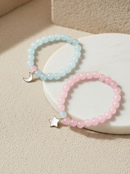 Buy Star and Moon Charms Pink and Sky Blue Beaded Bracelets Online in India - TheJewelbox