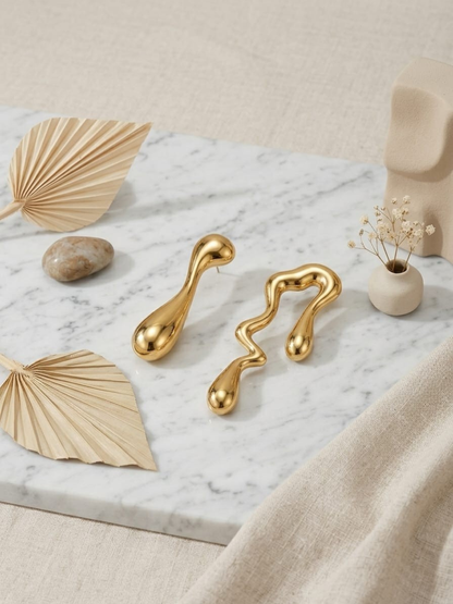 Buy Stylish Irregular Shaped Water Droplet Golden Earrings Online in India