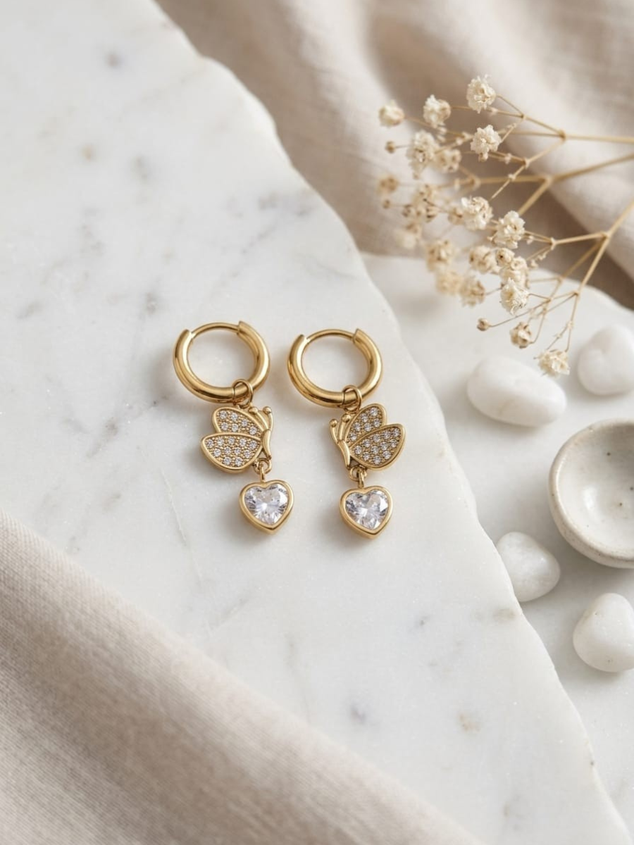 Buy Trendy Butterfly and Heart Drop Golden Huggie Hoop Earrings Online in India