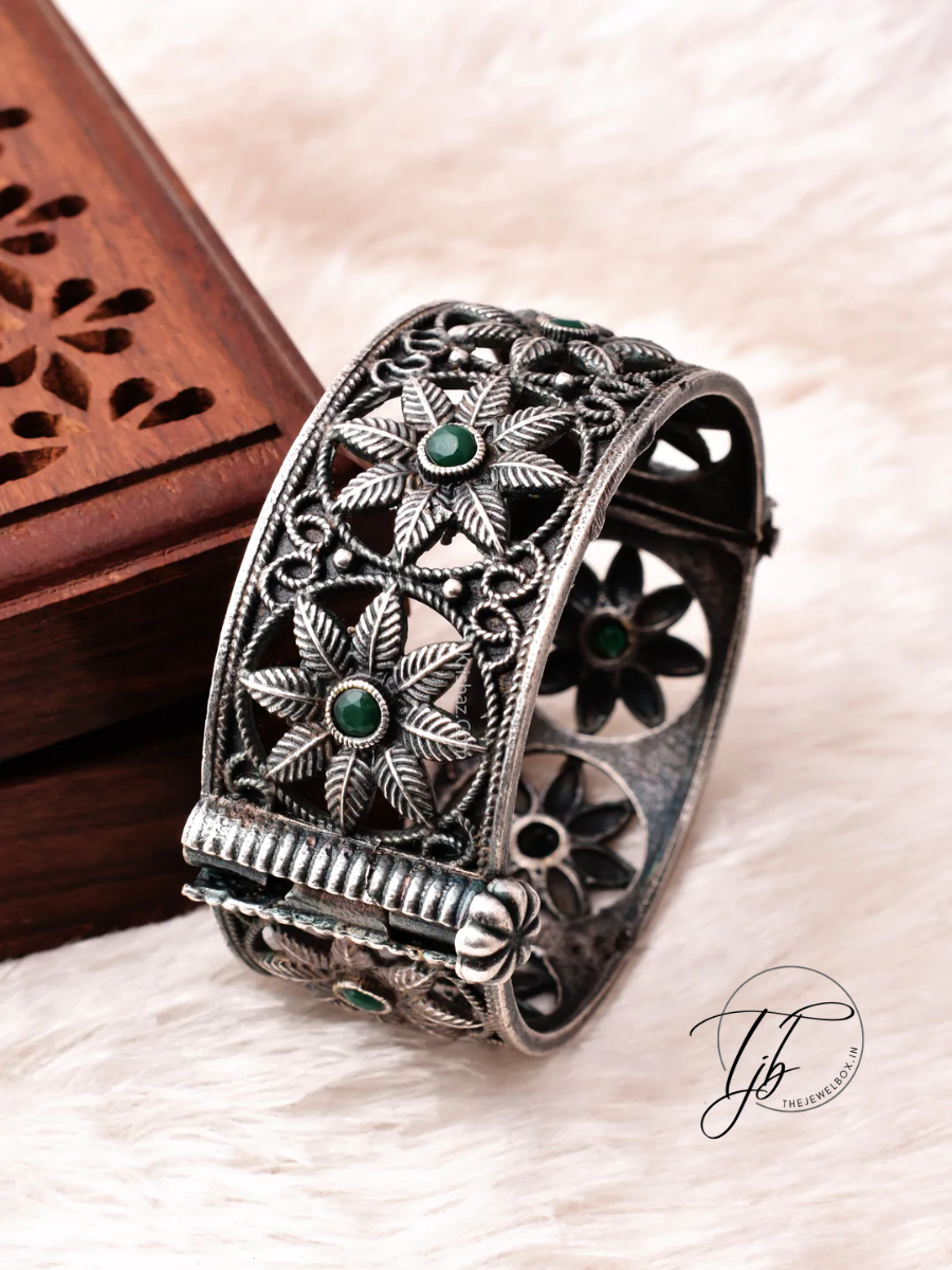 Buy Green Stone Studded German Silver Flower Shaped Kada Bangle - The Jewelbox